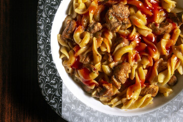 Corner Shot of Tasty Colorful Pasta in a plate