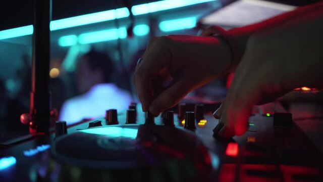 Sound control console for mixing dance music and laptop in disco club. close-up