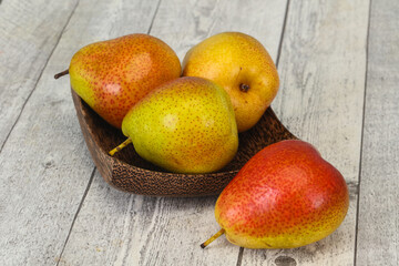 Pear heap in the wooden basket