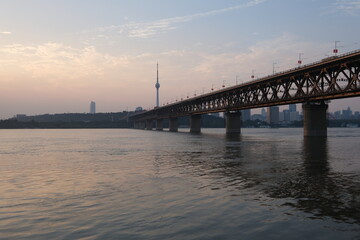sunset of Wuhan Yangtze River Bridge. landmark of Wuhan,Hubei,China.