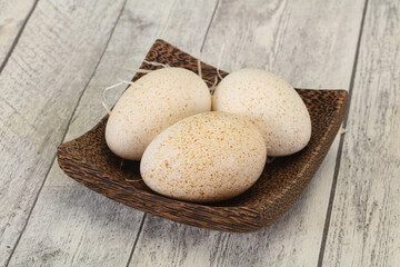 Three big raw turkey egg