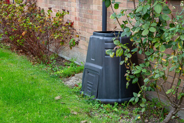 A compost bin in a garden
