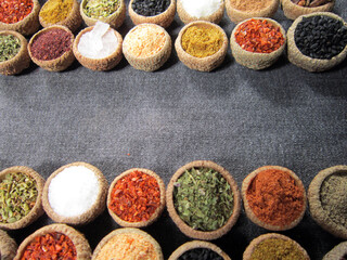   spices background, top view. glasses of spices