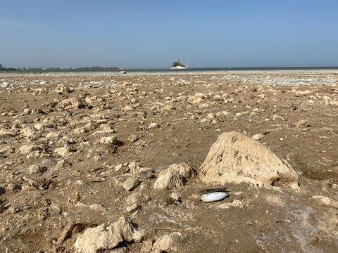 Drained muddy bottom of Tsimlyansk reservoir. A great ebb of sea. The problem of lack of drinking water, death to fish and stopping shipping. Environmental problem in Russia, Rostov region Volgodonsk