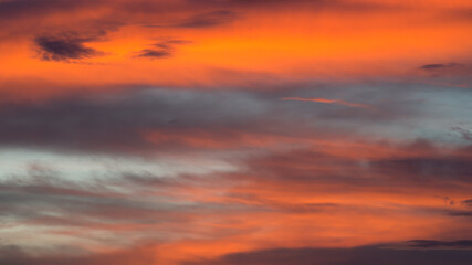 The evening sky and clouds change color.