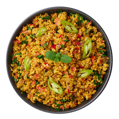 Masala Egg Bhurji or Muttai Podimas in black bowl isolated on white. Anda Bhurji is indian cuisine scrambled eggs dish with spices. Asian food and meal.