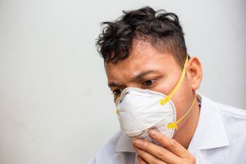 Asian men wear n95 mask protect covid 19 face close up
