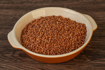 Raw buсkwheat cereal in the bowl