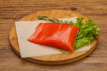 Salmon piece steak served rosemary