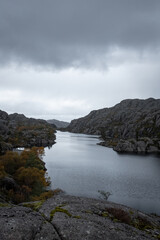 Fjord with Landscape and Cloudy Sky