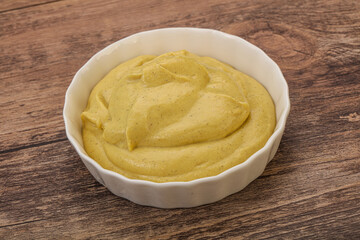 Dijon mustard sauce in the bowl