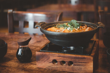 Japanese Sukiyaki in traditional cast iron pot