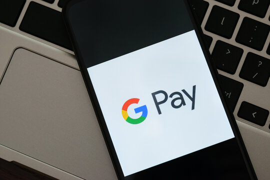Krakow, Poland - September 30, 2020: GPay application sign on the screen smartphone. Google Pay is a famous digital wallet platform