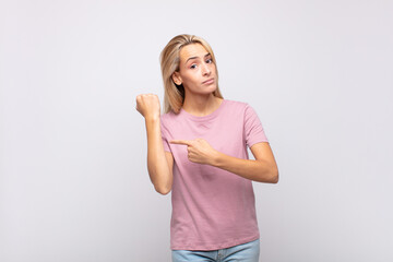  looking impatient and angry, pointing at watch, asking for punctuality, wants to be on time