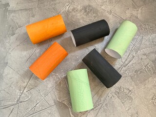 Colored toilet paper rolls in the color of the Halloween holiday