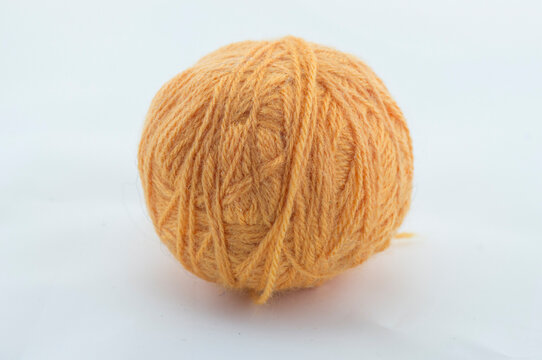 ball of orange thread