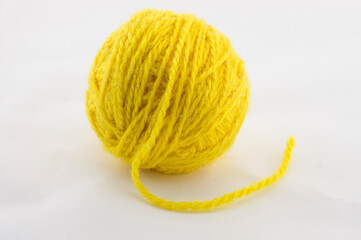 ball of yellow thread