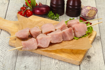 Raw pork meat skewer for grill