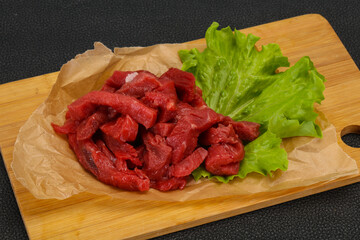 Raw beef meat sliced for cooking