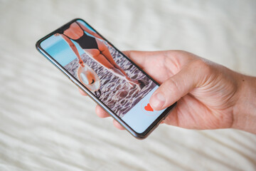 man likes photo of woman in social media mobile app