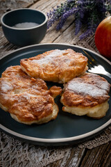 Homemade pancakes on a wooden table.