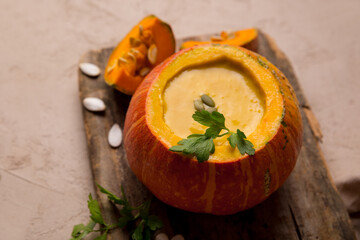 Pumpkin soup in pumpkin. Pumpkin, pumpkin seeds