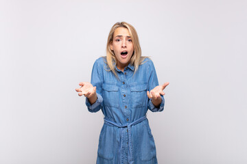  feeling extremely shocked and surprised, anxious and panicking, with a stressed and horrified look