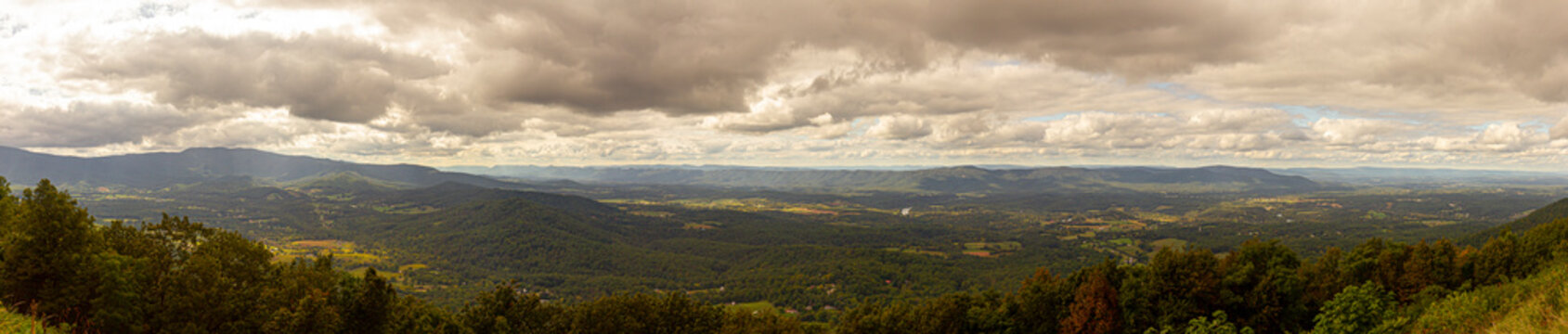 Panoramic view if Shenandoah valley observed from a scenic overlook by skyline drive. image features vast forests covering hills and mountains of blue ridge mountain range. © Grandbrothers