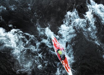 A girl doing kayaking down the river 2