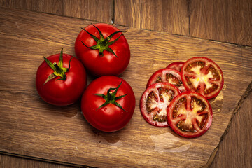 tomatoes on a wooden board