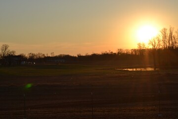Fototapeta na wymiar Open field with sunset