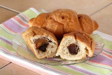 Croissants with cocoa and peanut fillings