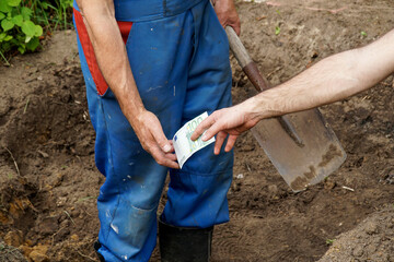 Digger gets money for work done.