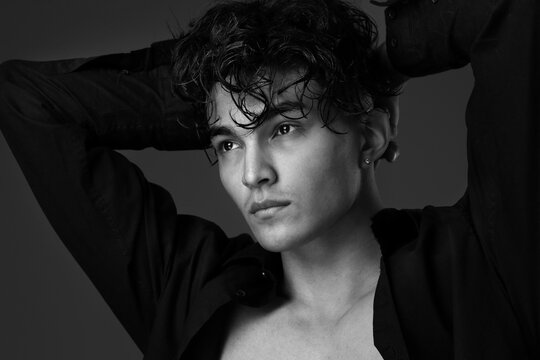 Black and white portrait of a man with an Asian appearance