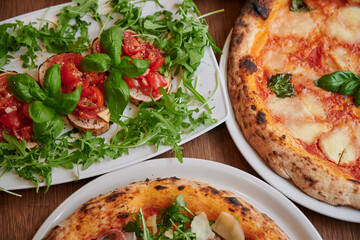 Pizza and salad on the table