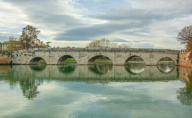 Fototapeta premium The Bridge of Tiberius (Italian: Ponte di Tiberio) or Bridge of Augustus Roman bridge in Rimini, Italy