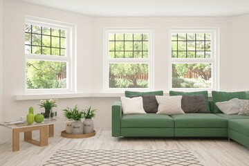Fototapeta premium White living room with sofa and summer landscape in window. Scandinavian interior design. 3D illustration