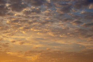 Obraz premium sunset with fluffy clouds