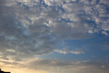 Naklejka na ściany i meble blue sky with white fluffy clouds