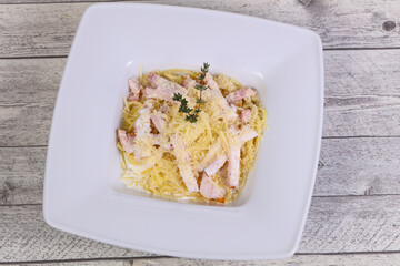 Pasta carbonara with ham and cheese