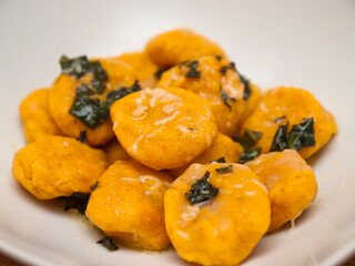 Carrot gnocchi with butter and sage