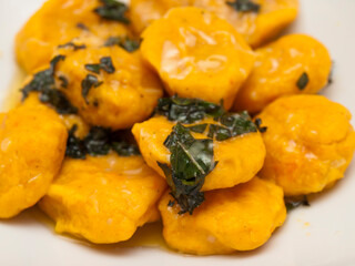 Carrot gnocchi with butter and sage