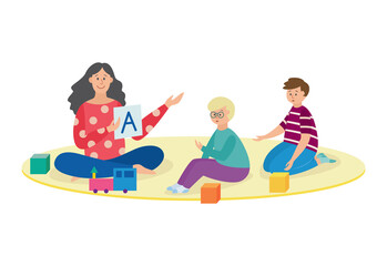 Teacher and kids learning alphabet letter in kindergarten.