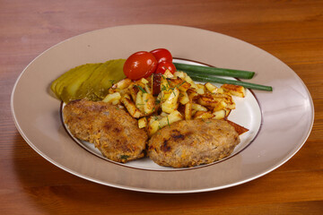 Homemade cutlet with roasted potato