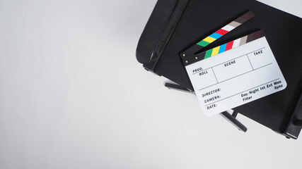 Director chair and Clapper board or movie slate on white background.