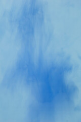 Blue abstract vertical background of smooth liquid veil