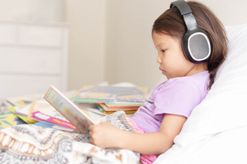People reading and listening to music at home. Rest and learning.