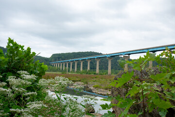 The Norman Wood Bridge Over the Susquehanna River on a Cloudy Sky