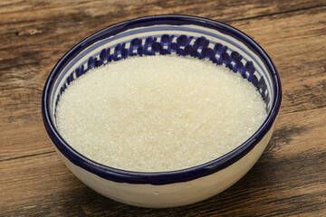 White sugar in the bowl
