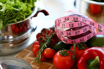 Purple Cabbage Wind Round Measuring Centimetre. Fresh Ripe Tomatoes. Assortment of Organic and Healthy Vegetable Ingredient. Aromatic Rosemary in Kitchen. Vegetarian Food Horizontal Photography